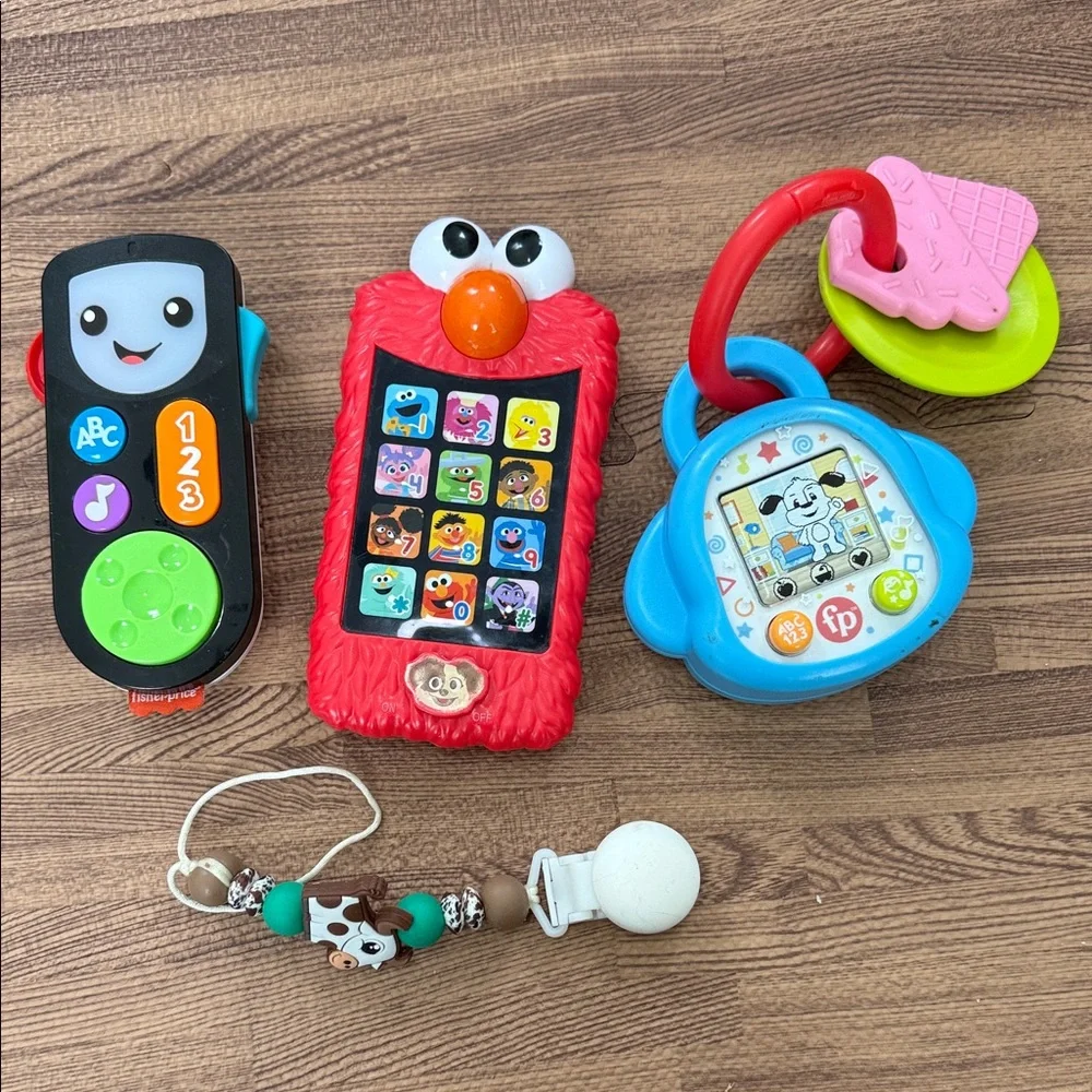 Baby Toys - Sesame Street Elmo Phone, Remote, Puppy Sound Toy, Cow Pacifier Clip - Picture 1 of 6
